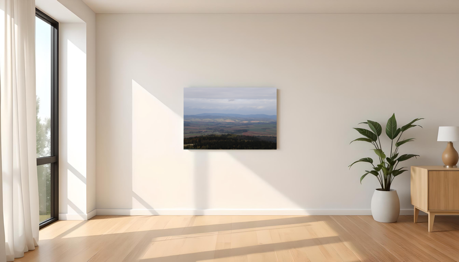 Obraz na płótnie z górską panoramą wiszący w nowoczesnym, jasnym wnętrzu