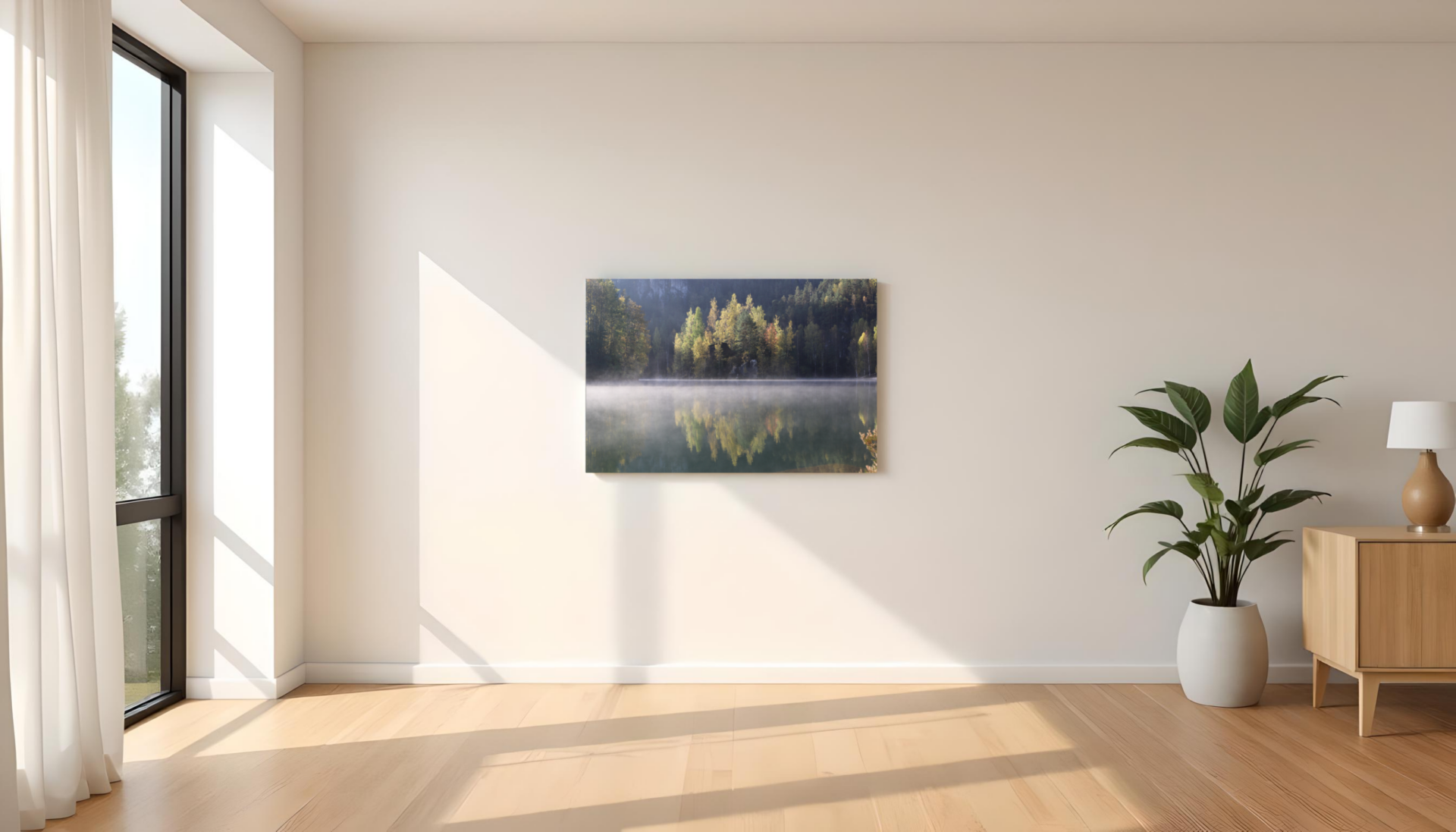 „Obraz na płótnie przedstawiający jesienny las nad jeziorem zawieszony w jasnym, minimalistycznym wnętrzu”